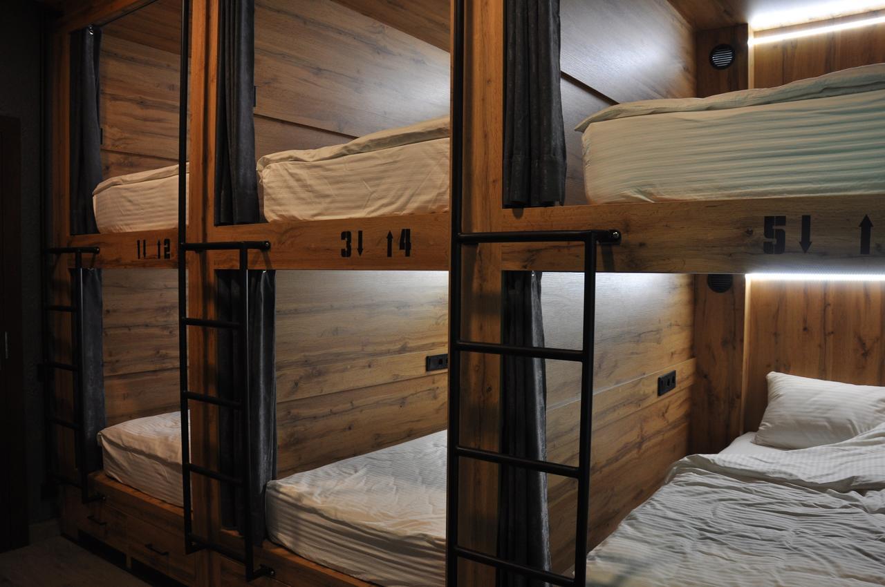 Full House Capsule Hostel Rivne Ngoại thất bức ảnh Beds in a capsule hotel