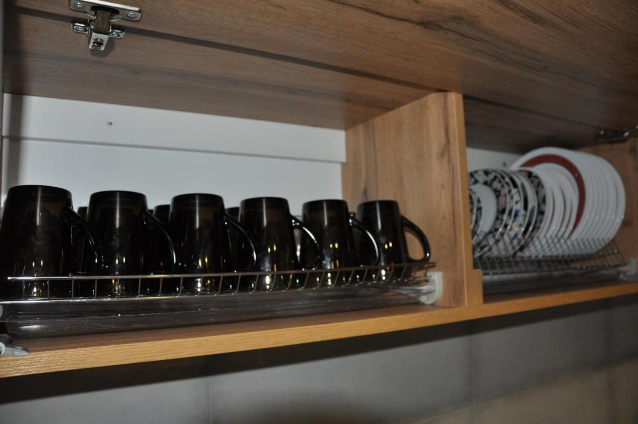 Full House Capsule Hostel Rivne Ngoại thất bức ảnh A typical kitchen cabinet