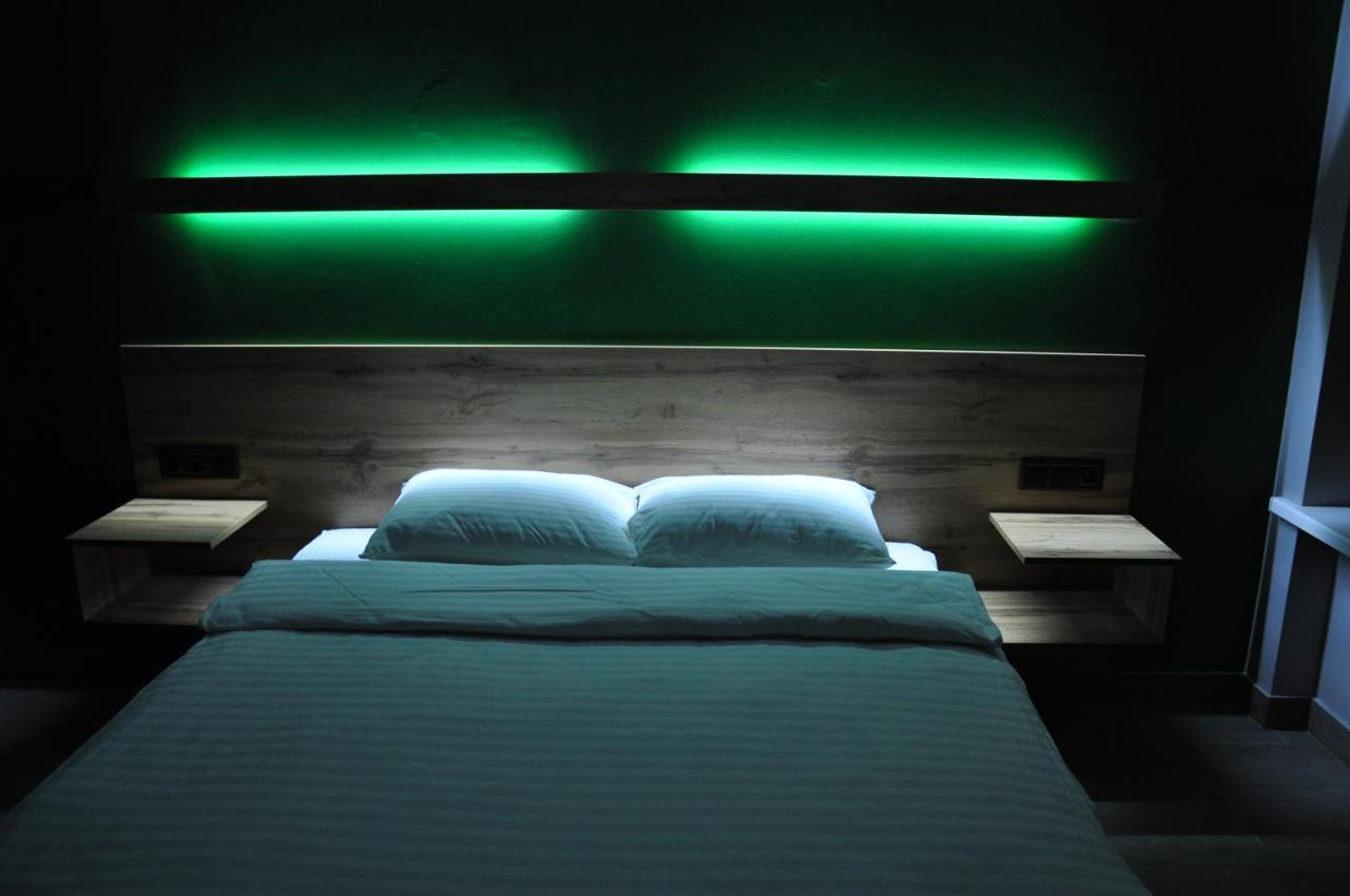 Full House Capsule Hostel Rivne Ngoại thất bức ảnh A room at the hotel
